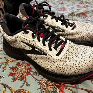 Brooks athletic shoes pink and white with black dots